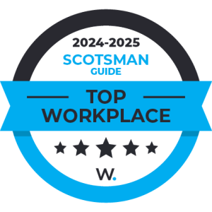 A circular badge reads 2024-2025 Scotsman Guide Top Workplace with five black stars and a blue ribbon design; a W. appears at the bottom center. A circular badge reads 2024-2025 Scotsman Guide Top Workplace with five black stars and a blue ribbon design; a W. appears at the bottom center.